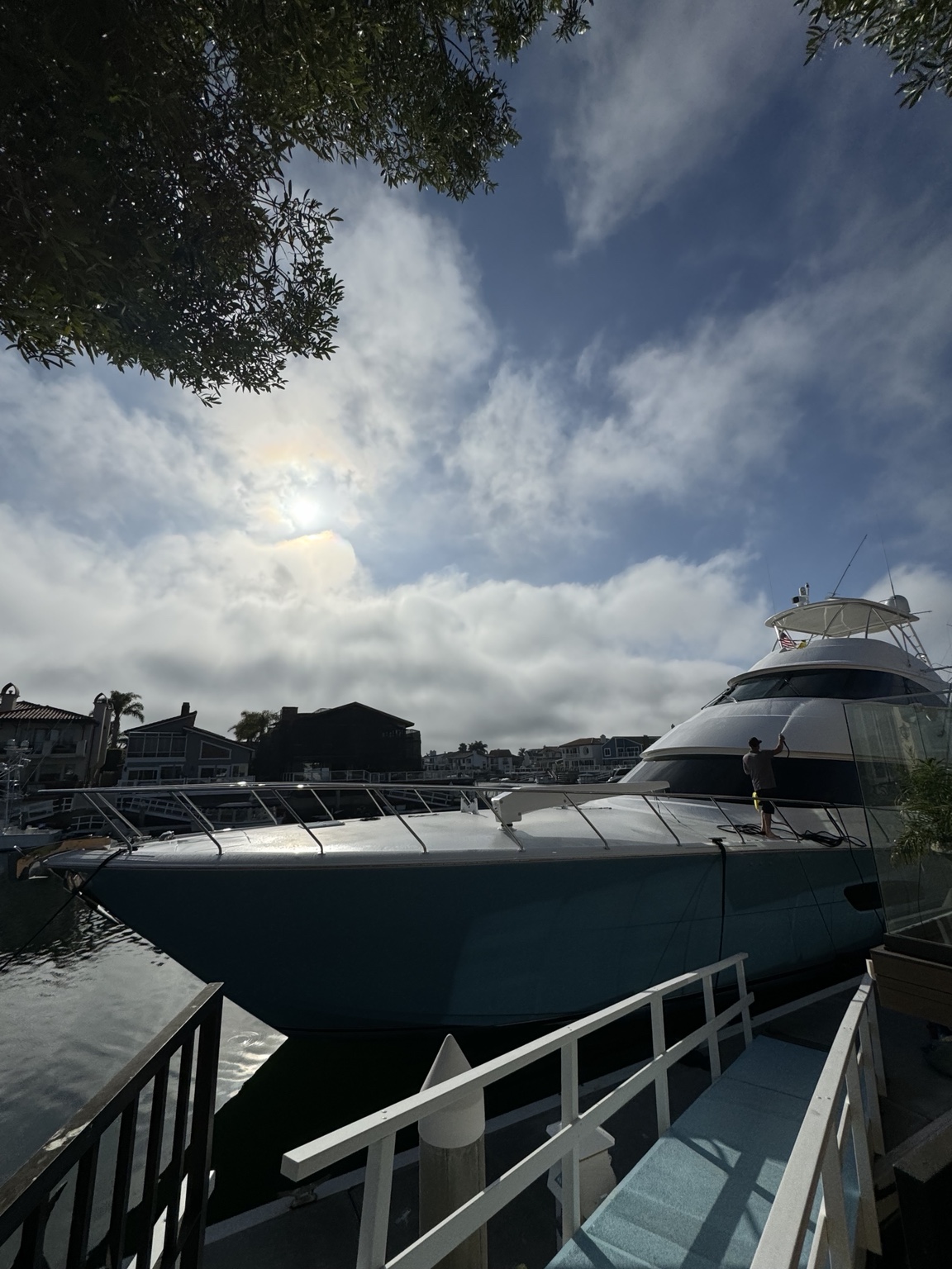 Aqualux detailing a yacht at the marina